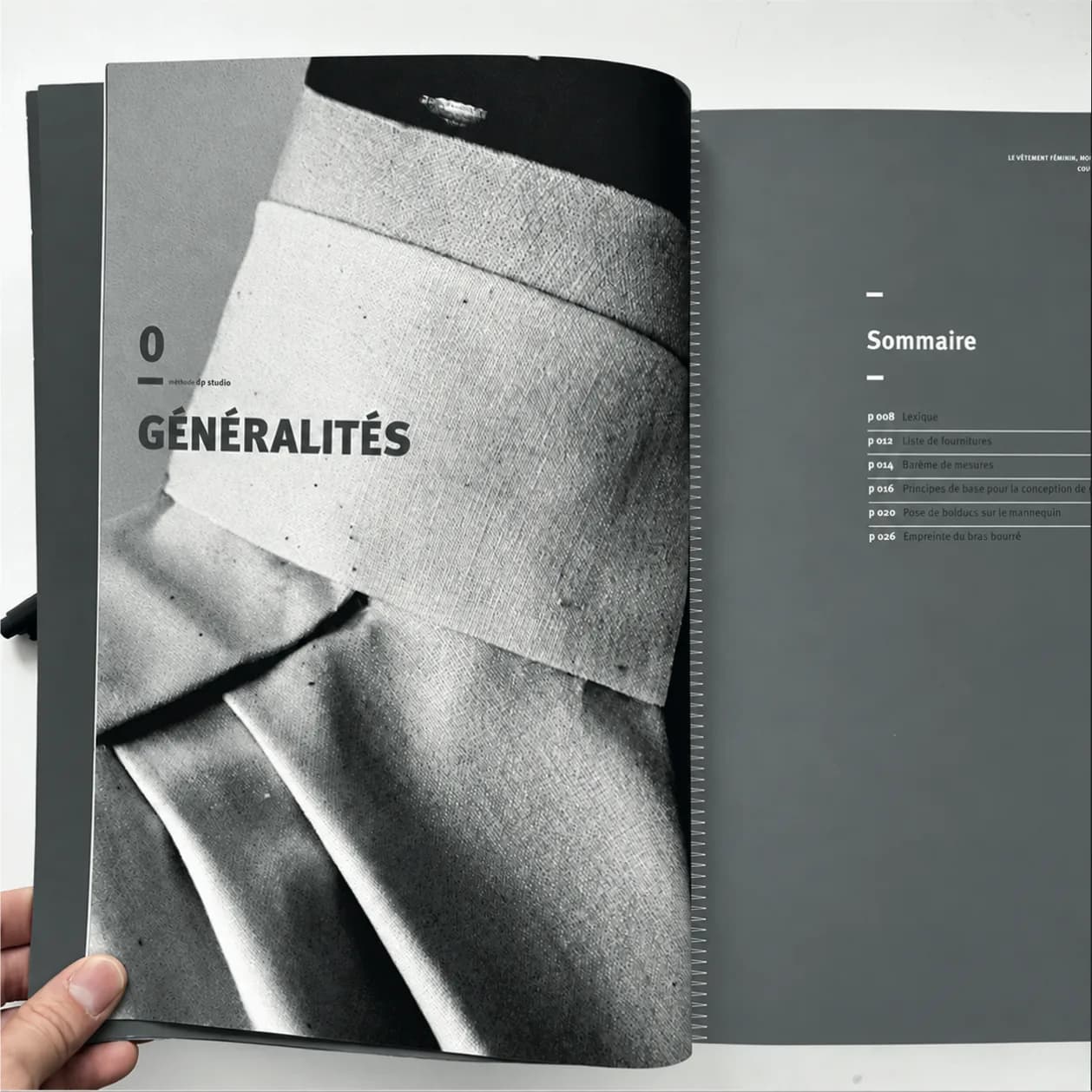 Volume 1 held open at “0 Generalities”, illustrated with a canvas collar, and at its contents